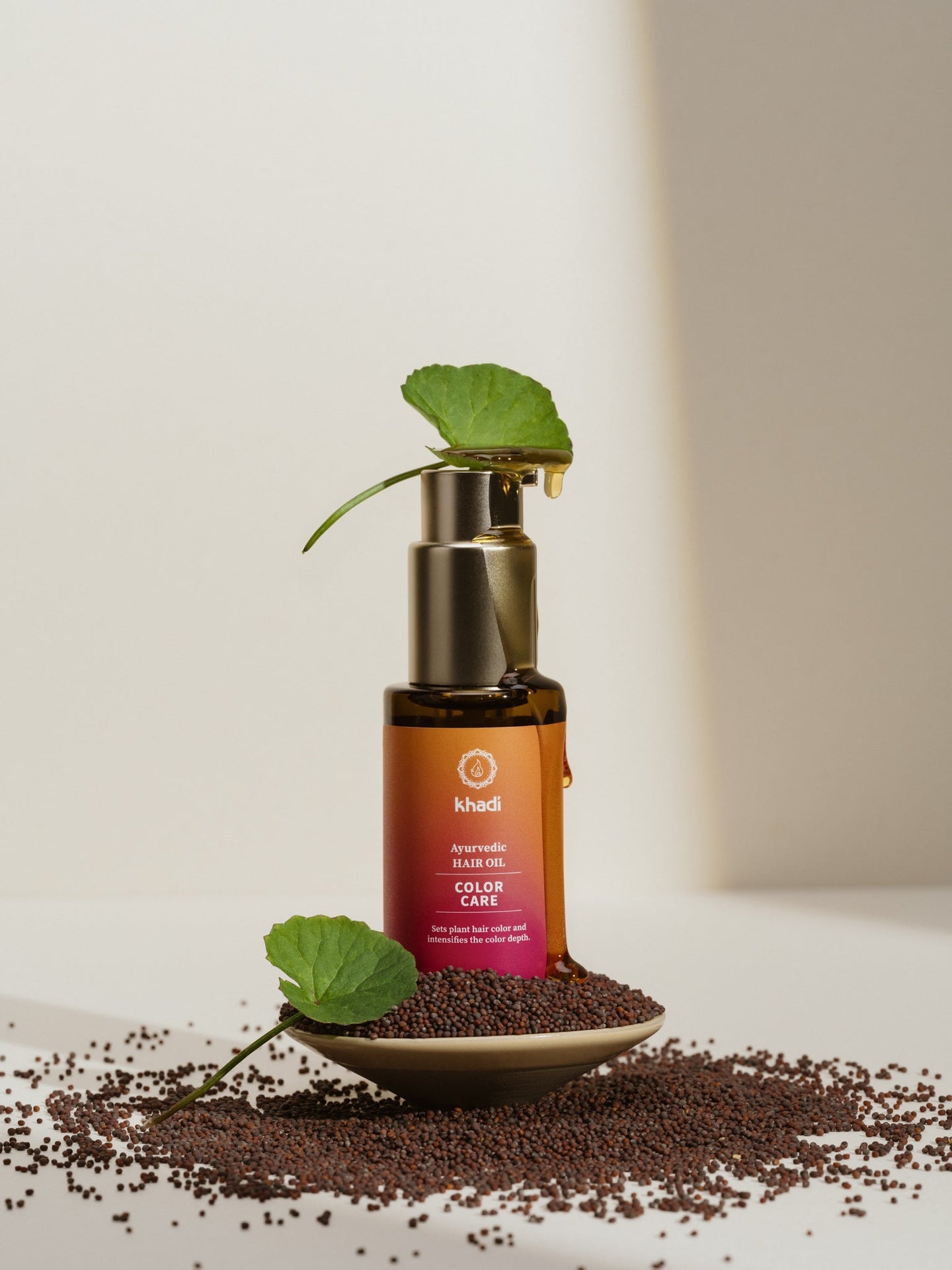 Aceite capilar Color Care con ingredientes como Centella