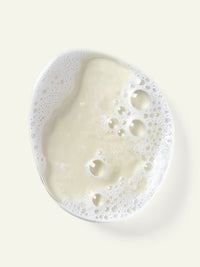 Imagen de textura de espuma de jabón de manos Pippali Pepper.