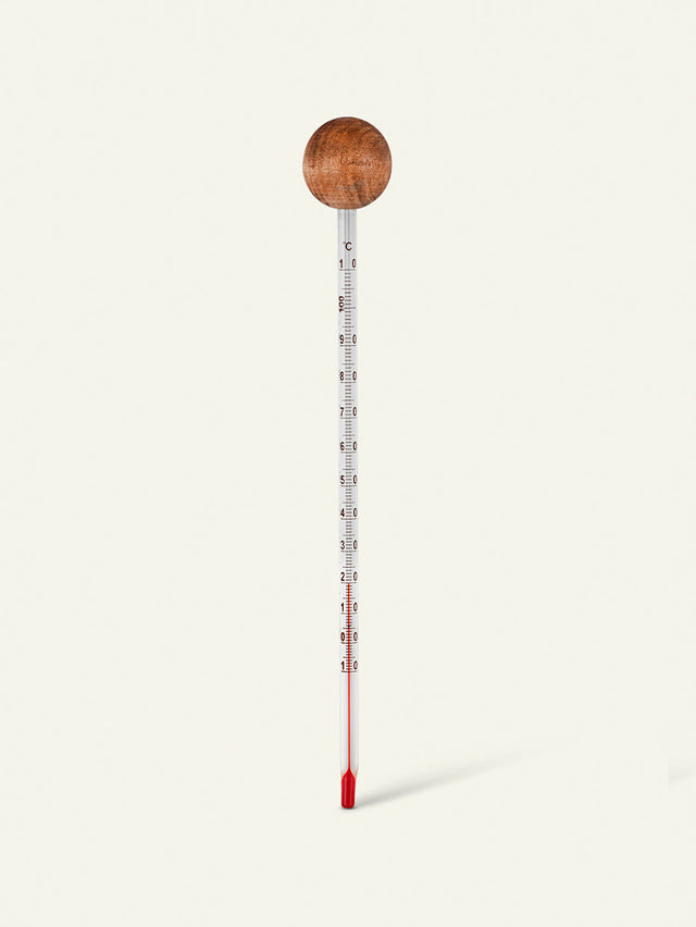 Bild von einem Holzthermometer, Haarpflege-Ausrüstung von Khadi