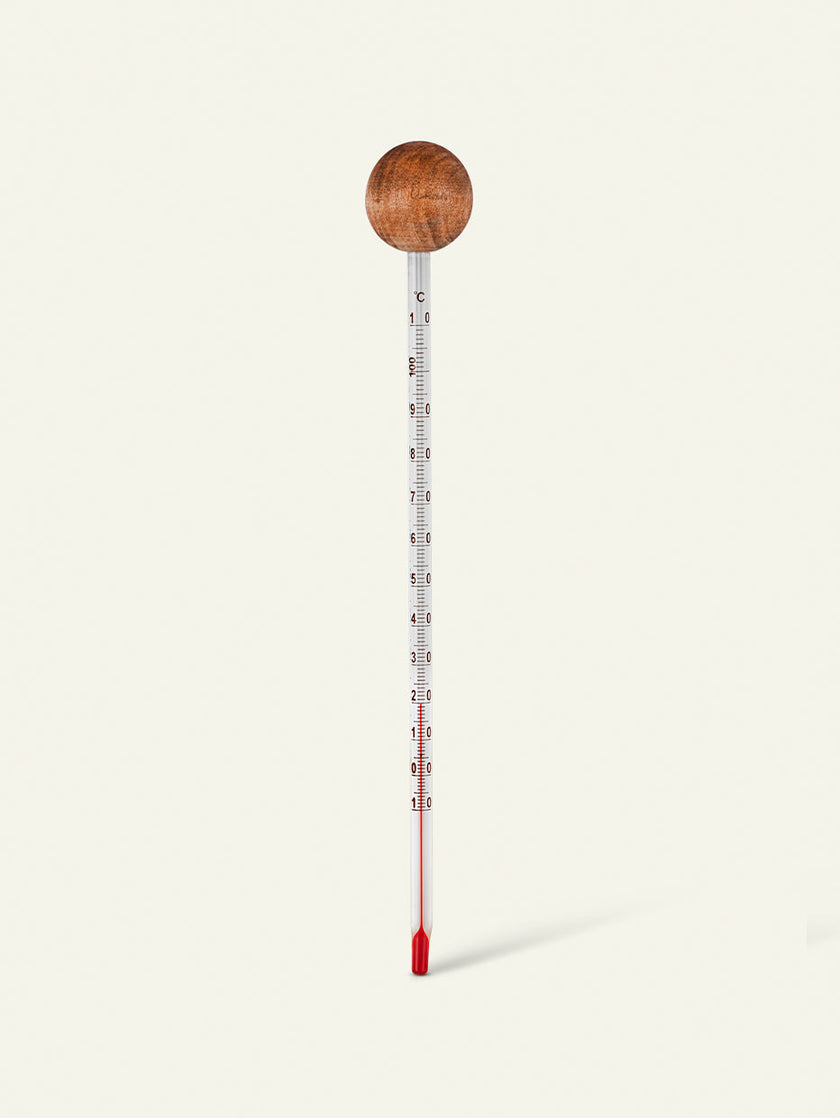 Bild von einem Holzthermometer, Haarpflege-Ausrüstung von Khadi